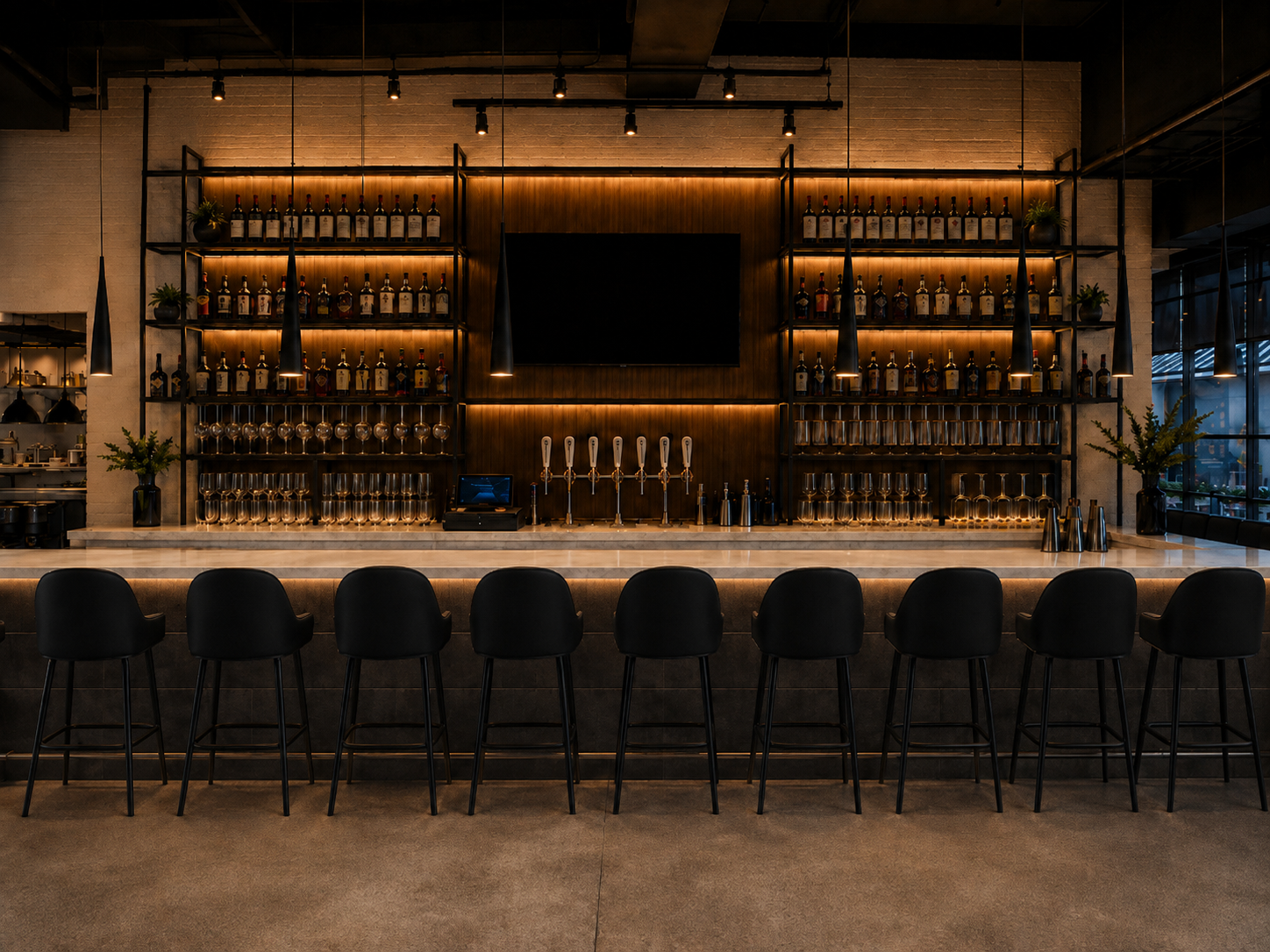 The warmly illuminated bar at Osteria Bella